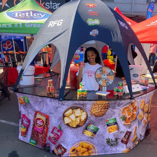 9 Yard Marketing wholesale promotional booth at a trade event.