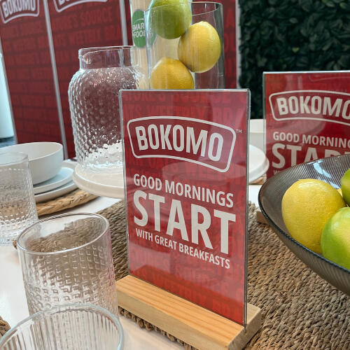 9 Yard Marketing printed POS materials and design collateral on display.