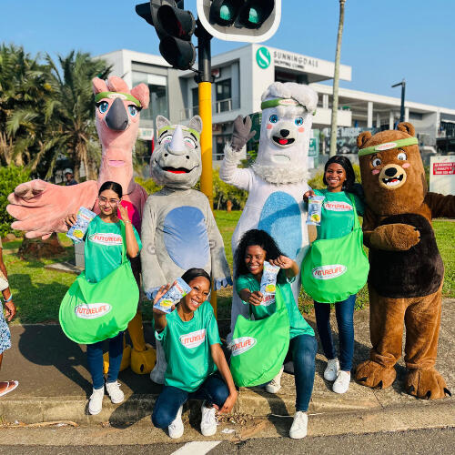 9 Yard Marketing brand mascots engaging with the public at an event.