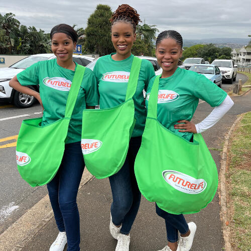 9 Yard Marketing out-of-home sampling team engaging passers-by.